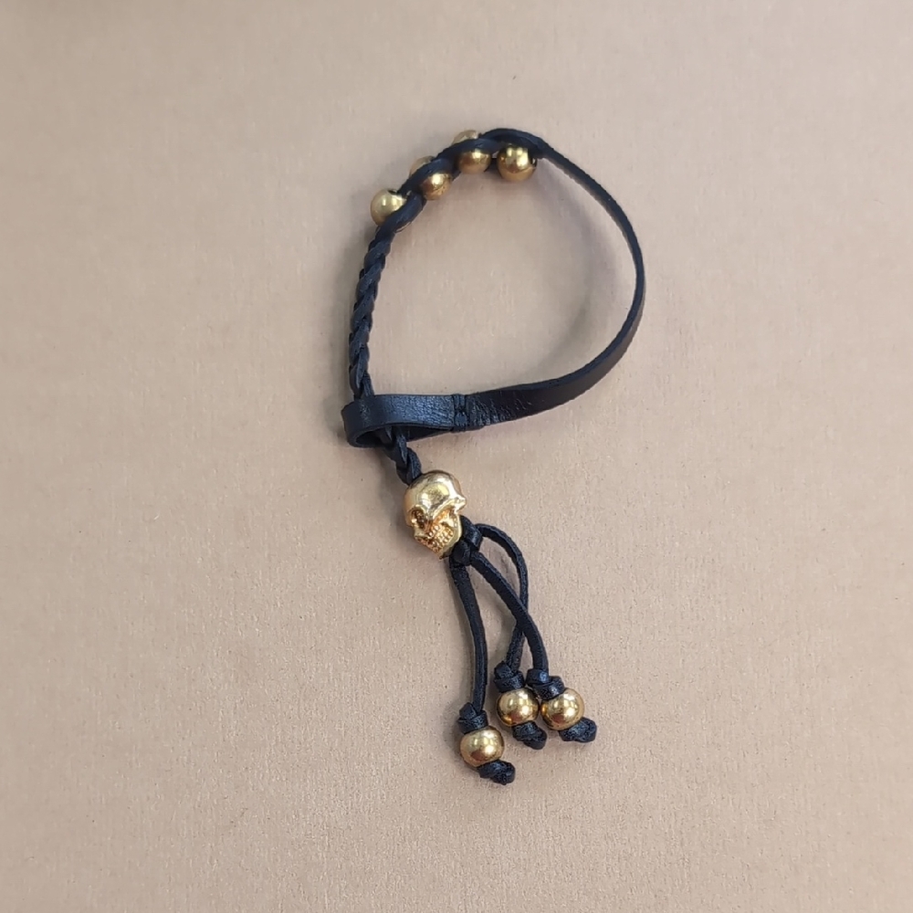 McQ by Alexander McQueen Black and Gold Skull Bracelet